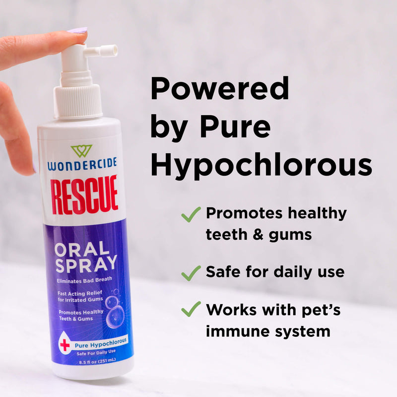 A hand presses the nozzle of a Wondercide RESCUE™ Oral Spray bottle. Text reads: Powered by Pure Hypochlorous, alcohol-free, safe for daily use, supports oral care and pet’s immune system (Wondercide).