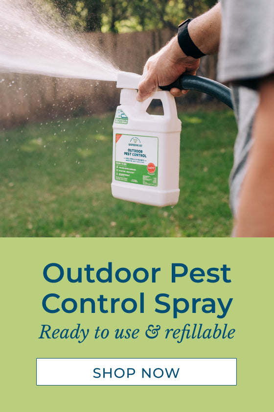A person sprays a garden with outdoor pest control spray from a white bottle. The bottom of the image has text promoting the spray as ready to use and refillable, with a Shop Now button.