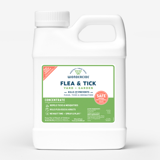 Wondercides Flea & Tick Concentrate for Yard + Garden is a 16 oz white jug with a label, offering effective pest protection using natural essential oils.