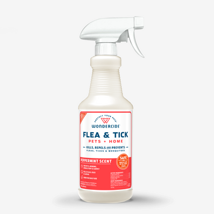 A 16 oz. white spray bottle of Wondercide Flea & Tick Spray for Pets + Home in peppermint scent offers plant-powered protection that kills, repels, and prevents fleas, ticks, and mosquitoes. Safe for use around dogs and cats.