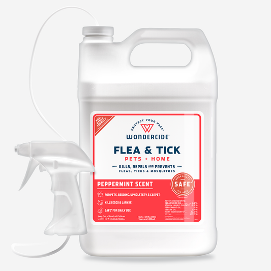 The 128 oz. white bottle of Wondercides Peppermint Flea & Tick Spray for Pets + Home includes a handle and spray nozzle, emphasizing natural essential oil protection with a peppermint scent. Its safe for daily use and repels fleas, ticks, and mosquitoes in pets and homes.