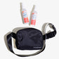 The Wondercide Peppermint Travel Kit features a black sling bag and two white bottles of bug sprays for pets and people, displayed on a white background.