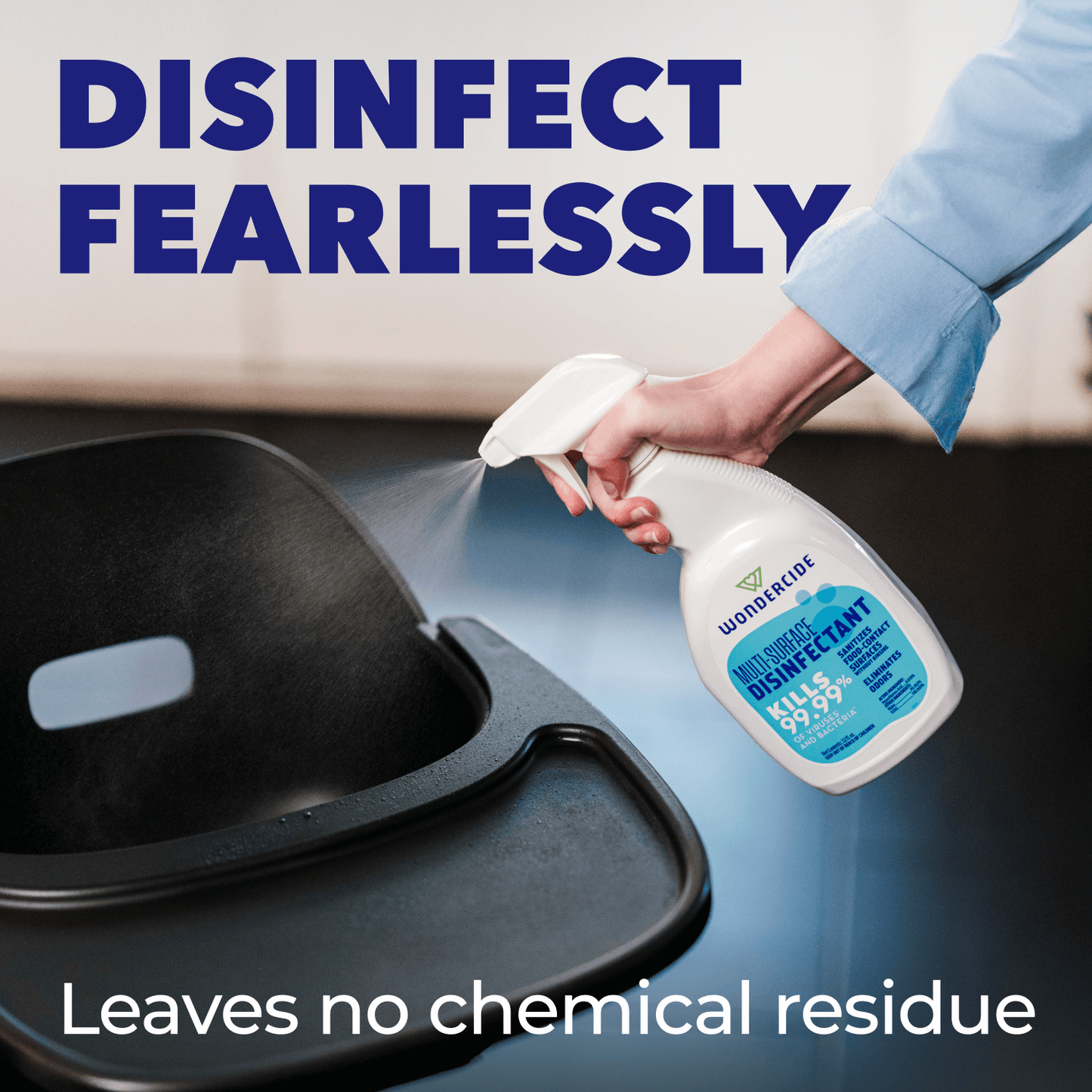 Person using a disinfectant spray on a surface with text 'Disinfect Fearlessly' and 'Leaves no chemical residue'.