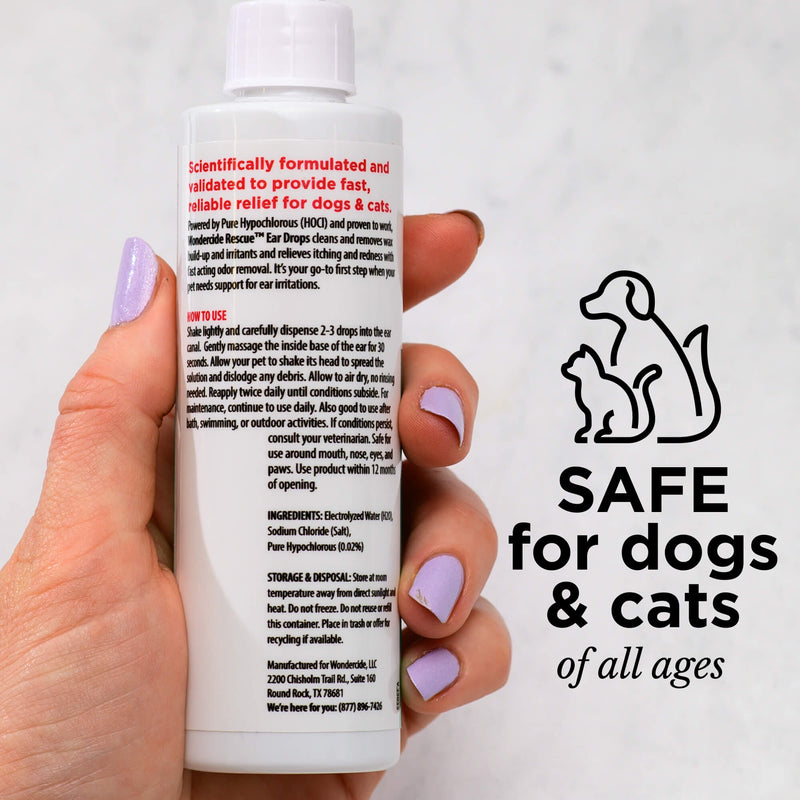 A hand with pastel purple nail polish holds a Wondercide RESCUE™ Ear Drops bottle. Text reads: SAFE for dogs & cats of all ages, beside simple dog and cat outlines—perfect to gently soothe ear irritation. Brand: Wondercide.