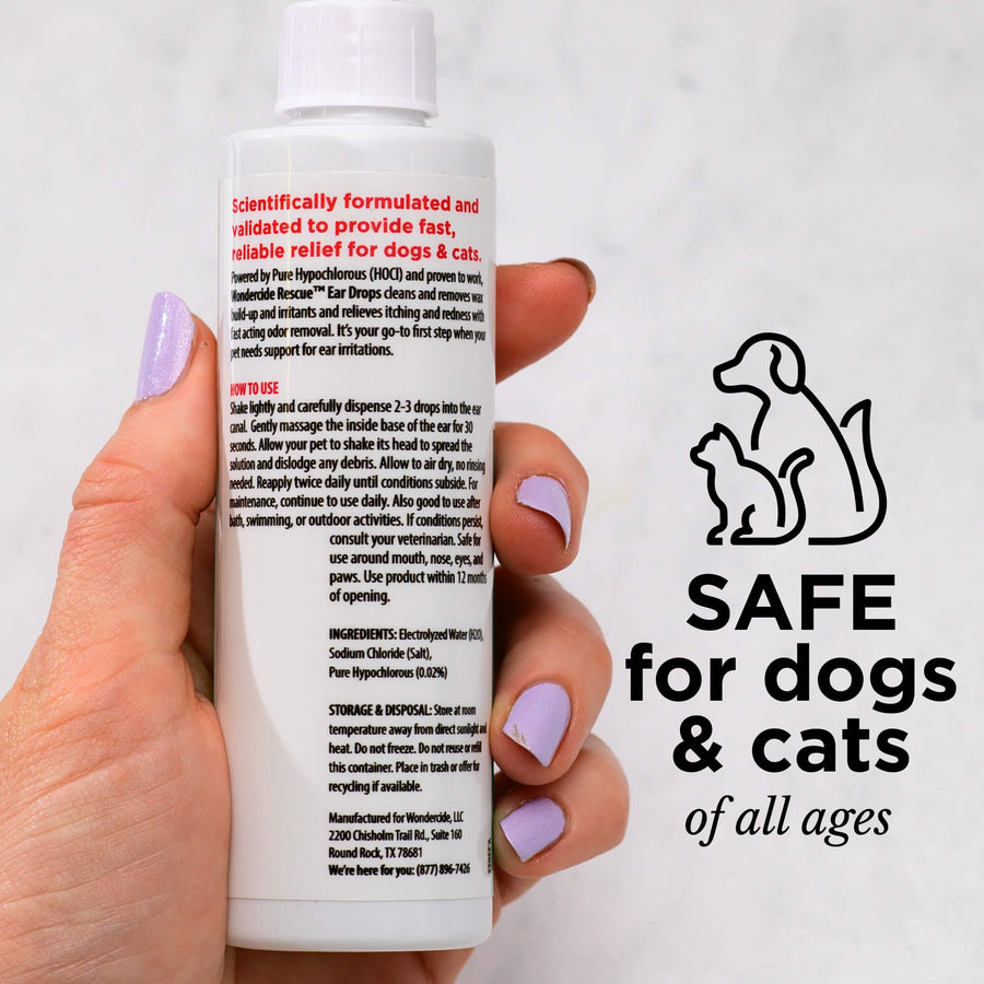 A hand with pastel purple nail polish holds a Wondercide RESCUE™ Ear Drops bottle. Text reads: SAFE for dogs & cats of all ages, beside simple dog and cat outlines—perfect to gently soothe ear irritation. Brand: Wondercide.