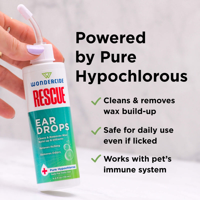 A hand holds a bottle of Wondercide RESCUE™ Ear Drops with a nozzle. Text: Powered by Pure Hypochlorous for ear wax removal, soothing ear irritation, safe if licked, and supports your pet’s immune system. By Wondercide.