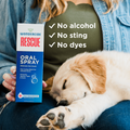 A person holds a box of Wondercide RESCUE™ Oral Spray by Wondercide next to a sleeping puppy. On the image: Alcohol-free, No sting, No dyes (all checked)—gentle daily oral care for your pet.