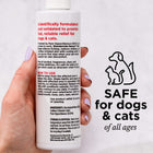 A hand holds a Wondercide RESCUE™ Skin Spray bottle, labeled with instructions and ingredients for skin relief. Beside it, a line drawing of a dog and cat shows the text, “SAFE for dogs & cats of all ages.” Safe for sensitive areas.
