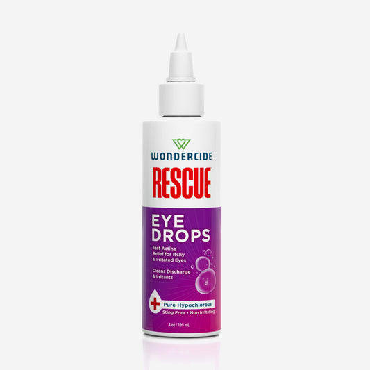 A white bottle of Wondercide RESCUE™ Eye Drops with a pointed nozzle and purple label, formulated with hypochlorous for fast relief from eye irritations, plus cleaning discharge and removing harmful irritants.