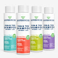 Four bottles of Wondercide Flea & Tick Shampoo are displayed in cedarwood, peppermint, lemongrass, and lavender scents. These white bottles have colorful labels and provide natural protection against fleas and ticks.