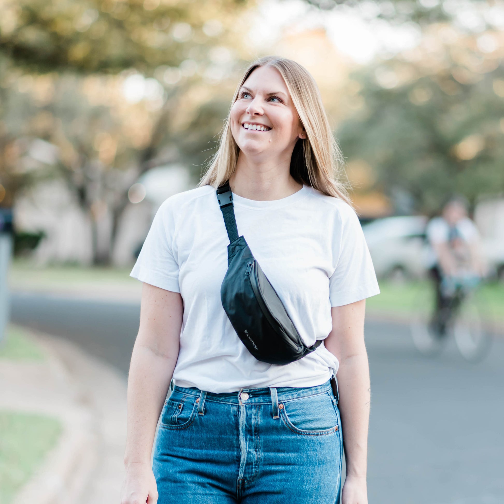 Sling bag being worn over the shoulder